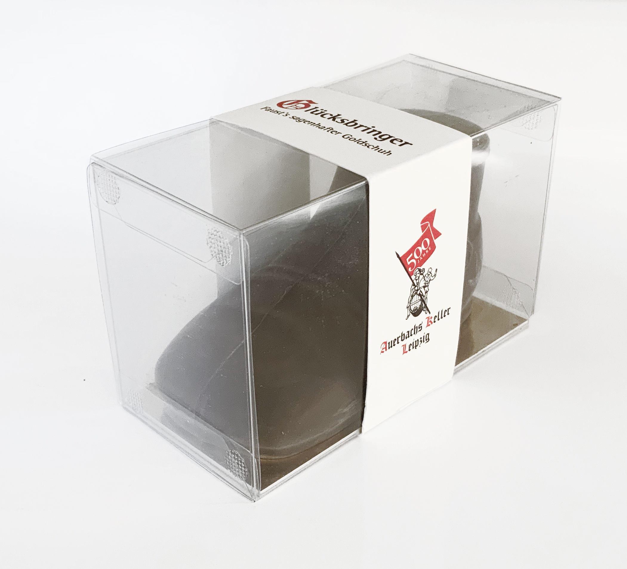 Faust's Schokoladenschuh mit Goldstaub in der Verpackung